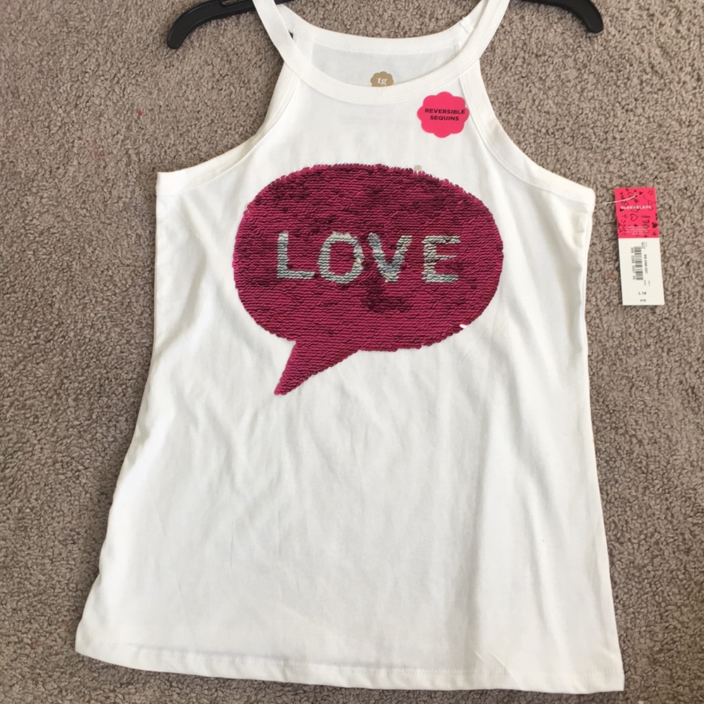 A white kids reversible sequins top